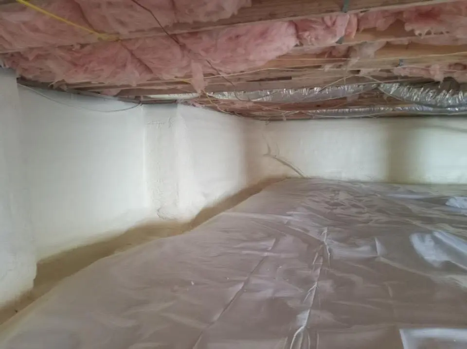 Crawl space encapsulation with closed-cell spray foam for Roof Waterproofing in Lansing